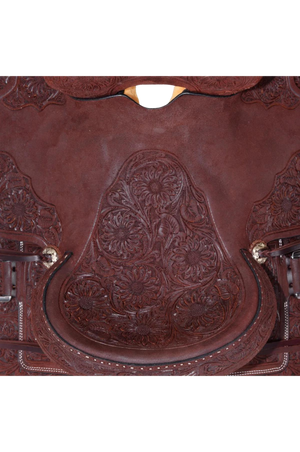 A brown Circle Y Burnett Flex2 Trail Saddle with detailed tooling and a classic ranchy look.