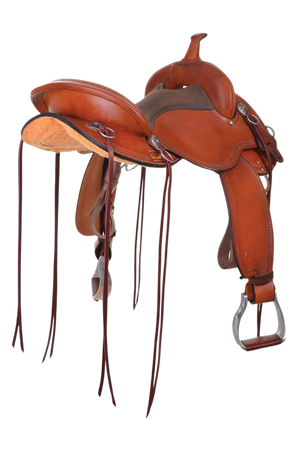 A brown Circle Y Gillette Trail saddle with a wood tree and DURAhide coating, designed for broad shouldered, short backed horses.