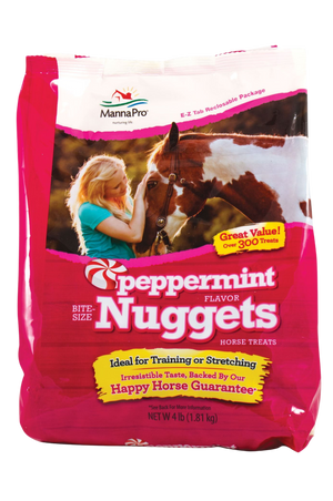 A bag of Manna Pro bite-size nuggets horse treats with a picture of a woman and her horse on the packaging.