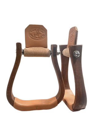 A pair of brown Nettles Chisholm stirrups, designed for use with a saddle, featuring a rustic finish and metal hardware.
