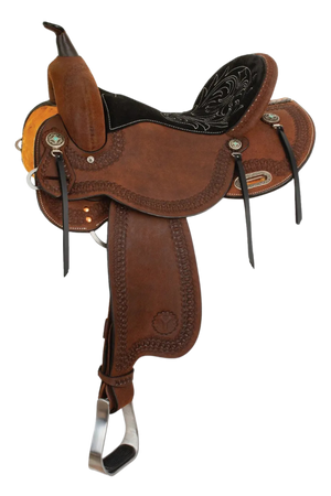 A brown Cloverleaf Barrel saddle with chocolate suede seat, lace tooling, and turquoise conchos.