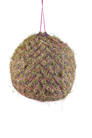 A deluxe hay net with metal rings, hanging, and made of a textile material with a checkered pattern.