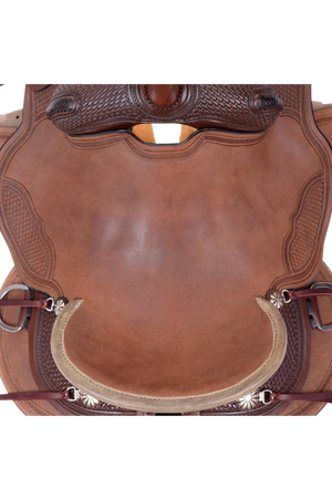 A brown Circle Y Brazos Wood Trail Saddle with a wooden tree and leather straps.