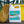 A white bottle of ABSORBINE COOLDOWN HERBAL RINSE with a label featuring green and herbal design elements.