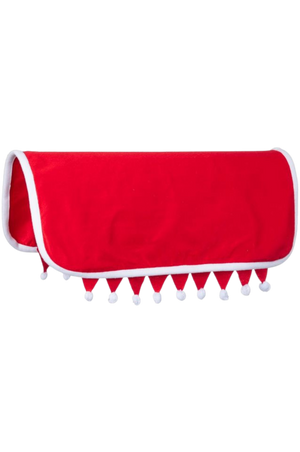 A red felt Santa Western saddle pad cover with plush white fleece trim and decorative pom-poms.