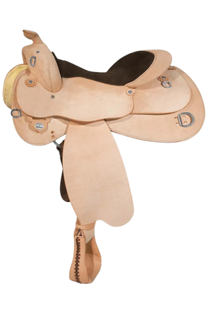 A beige Circle Y roughout trainer saddle with a brown suede seat, stainless steel hardware, and a Pelican horn.