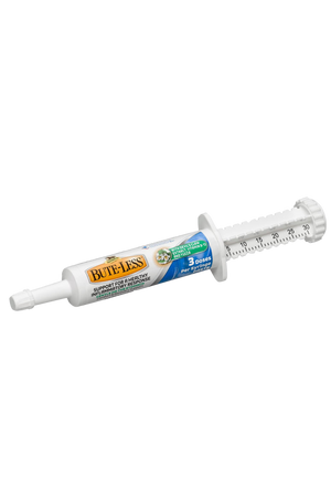 A syringe of ABSORBINE BUTE-LESS PASTE, with packaging that includes product information.
