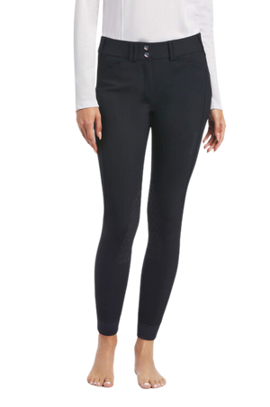 A pair of navy blue knee patch riding breeches with a white belt and white shirt, designed for equestrian activities.