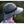 A black golf visor with a bow detail in the front.