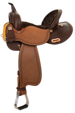 A brown Circle Y Alice Barrel saddle with copper spots and conchos, turquoise hardware, and a rounded skirt.