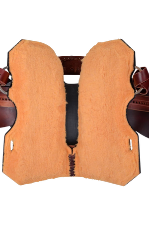 A brown Circle Y Redwood Barrel Saddle featuring chestnut roughout leather, gunmetal conchos, and a hardseat.