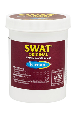 SWAT fly repellent ointment, one labeled as SWAT Original in pink, and the other as SWAT Clear in blue, both with red text and branding.