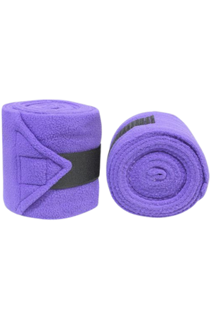 Vac's Deluxe Polo bandages wrapped around a horse's forelimbs, showing the folded ends with hook and loop fasteners.