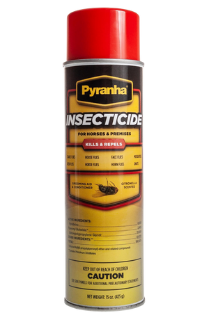 A can of Pyranha insecticide spray with red cap and label detailing the product use for horses and ponies.