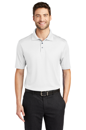 A man wearing a white short-sleeved performance polo shirt with a collar, a 3-button placket, and black pants.
