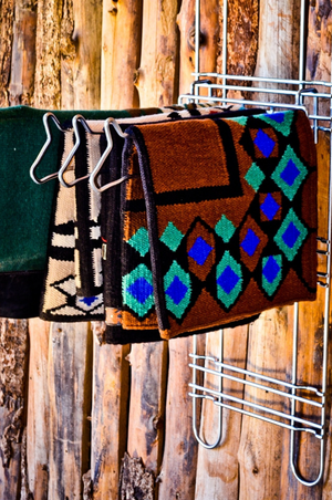 SADDLE PAD HOLDER FOR MAIN FRAME