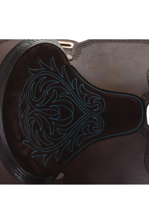 A brown barrel saddle with a chocolate suede seat, turquoise stitching, copper and turquoise conchos, and aluminum stirrups.
