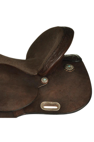 A brown Circle Y Kelly Kaminski barrel saddle with a wooden tree, designed for western riding.