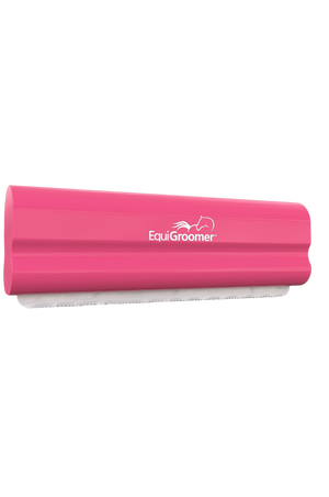 A pink EquiGroomer pet grooming tool with a wave-style blade, designed for removing fur and dirt from pets.