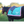 A custom saddle towel with blue, white, and pink colors, featuring embroidery on the sides.