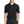 A man wearing a short-sleeved performance polo shirt with a collar, a 3-button placket, and black pants.