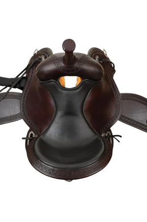 A brown and black Circle Y South Mountain Flex 2 Trail saddle with a short skirt designed for short-backed horses.