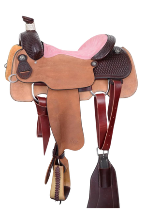 A brown roper saddle with black iron sun conchos, a pink suede seat, and a nylon horn wrap. It features walnut finish with hand-tooling and a baby powder holder.