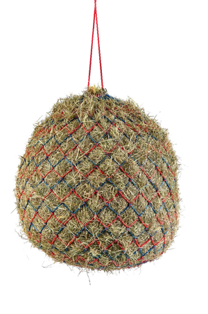 A deluxe hay net with metal rings, hanging, and made of a textile material with a checkered pattern.