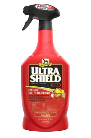 A red spray bottle labeled UltraShield Red for equine fly spray.