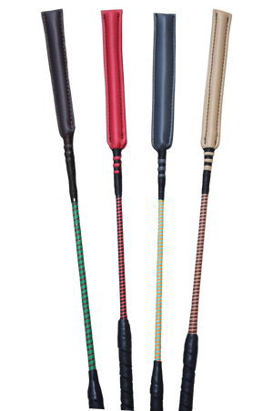 A collection of custom handmade soft crop whips with various handle colors and poppers.