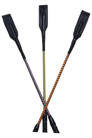 A collection of custom handmade soft crop whips with various handle colors and poppers.