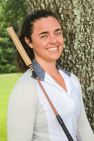 A collection of custom handmade soft crop whips with various handle colors and poppers.