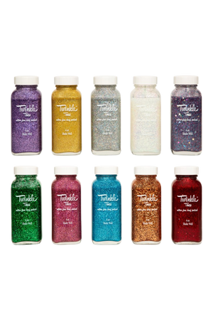 A collection of bottles in various colors labeled 'TWINKLE TOES', indicating a variety of glitter solutions for horse hooves.