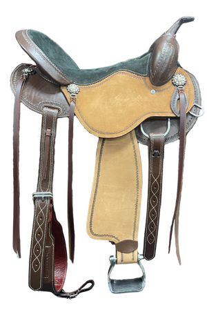 Western saddle with leather straps on a white background