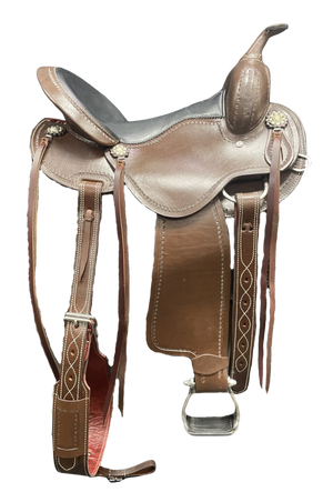Brown leather saddle with decorative elements on a white background