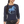 Woman wearing a navy long-sleeve shirt with a blue horse graphic on a white background