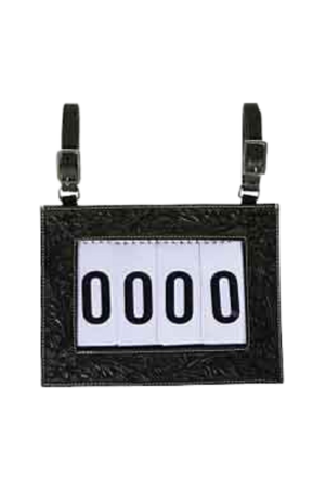 A tooled-leather number holder with adjustable straps and a white display for contestant numbers.