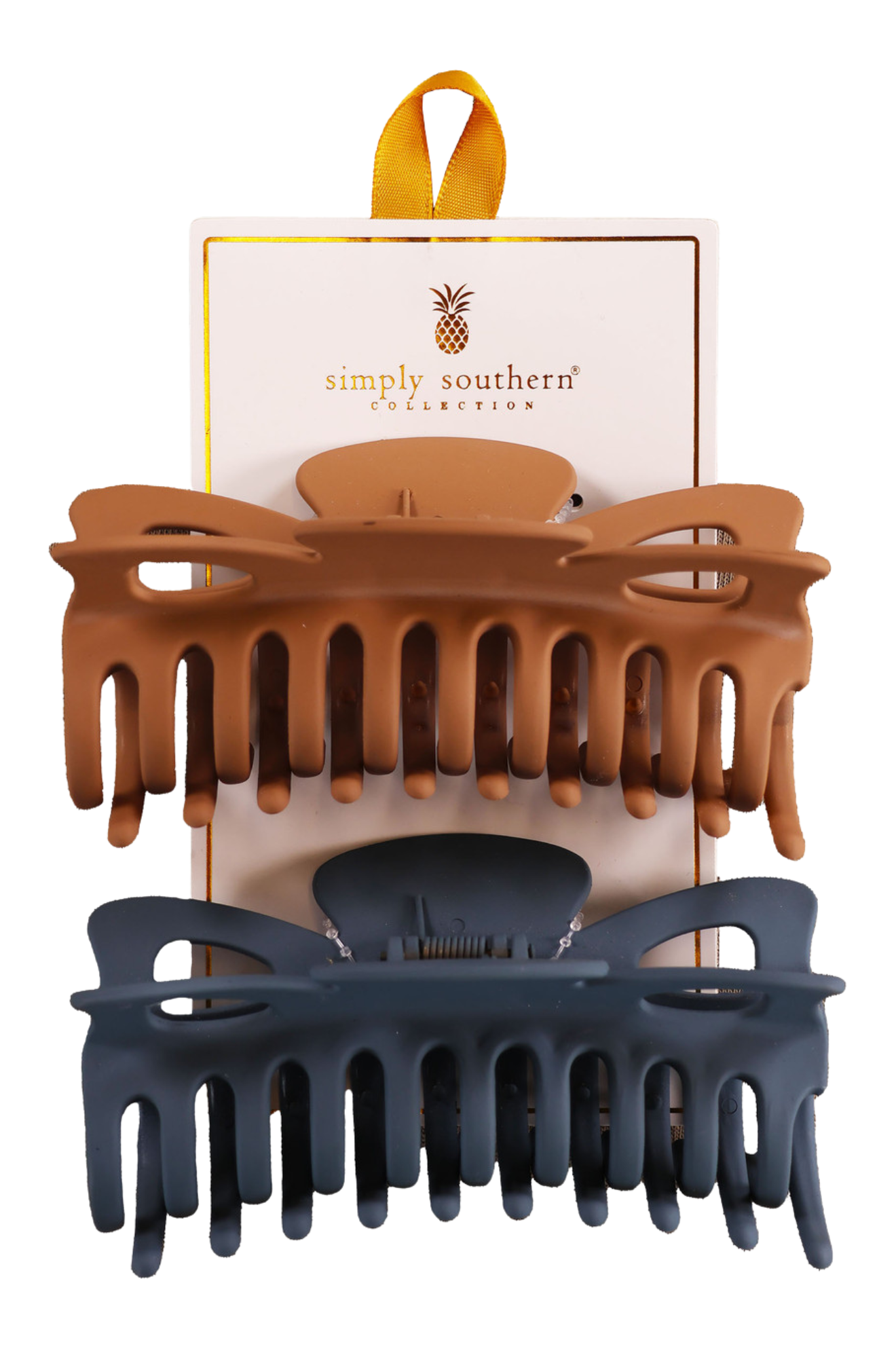 Two hair clips, one green and one brown, displayed on a vertical cardboard stand with a logo at the top.