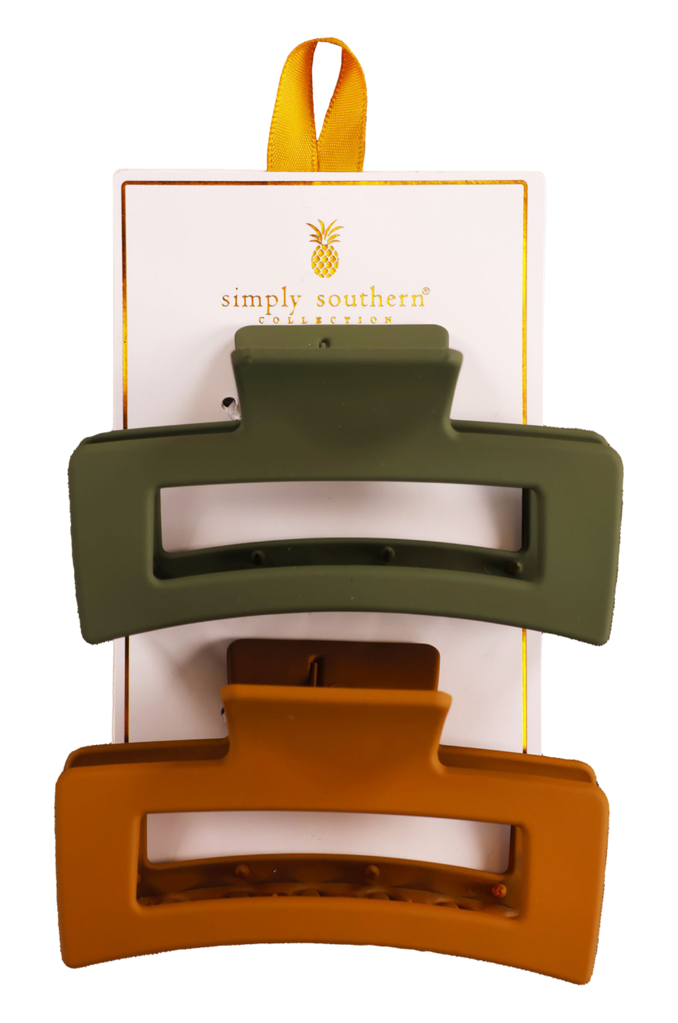 Two hair clips, one green and one brown, displayed on a vertical cardboard stand with a logo at the top.