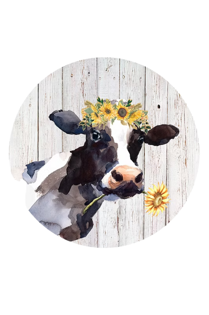 Cow with sunflower headband on a wooden background