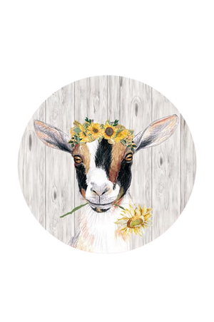 Goat with sunflower wreath on wooden background