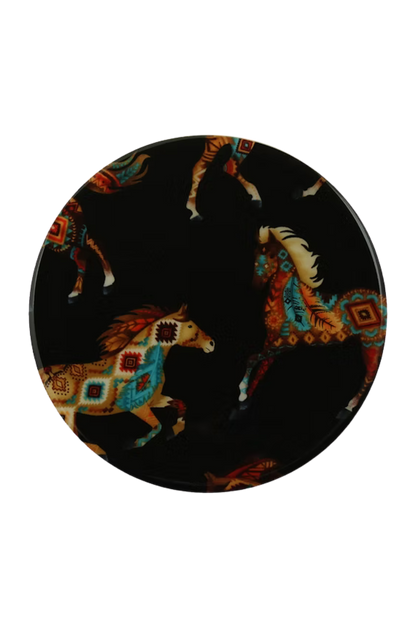 Round decorative item with horse designs on a black background