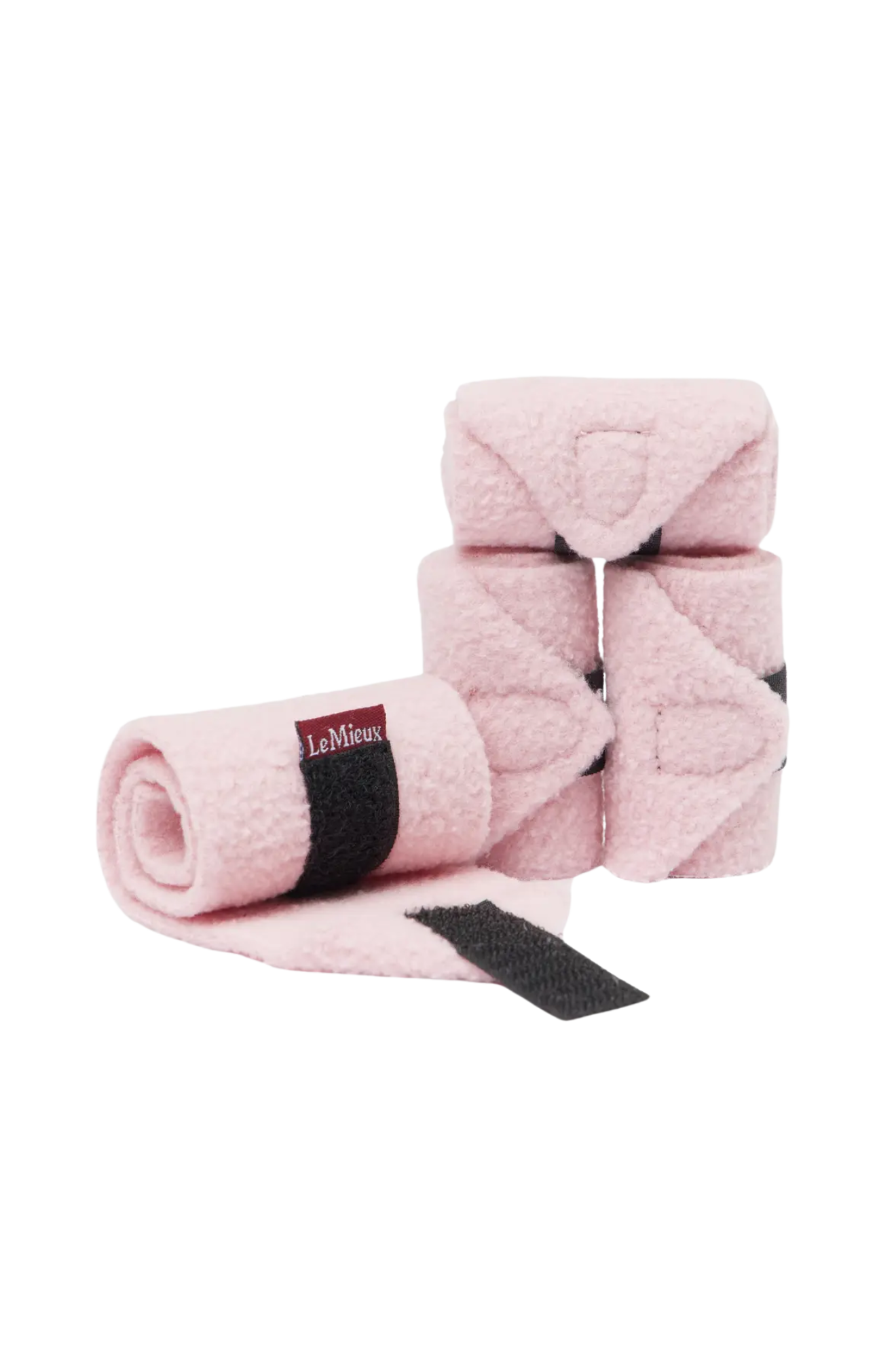Pink horse with black straps on a white background