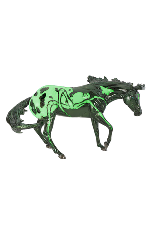 Toy horse with green design on a white background