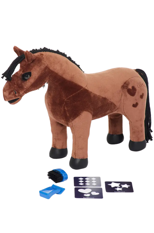Plush horse toy with grooming tools and cards on a white background