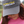 Person wearing a gray cap with 'Tack Shack of Ocala' branding, blurred background