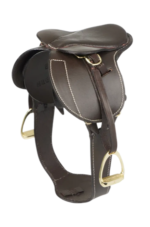 Brown leather saddle with gold hardware on a white background