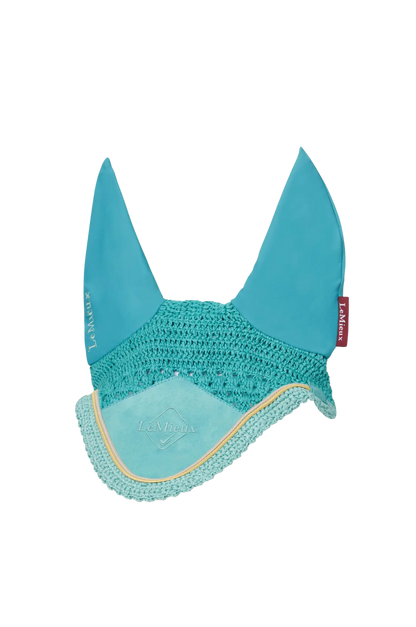 Teal crochet ear bonnet with brand label on a white background