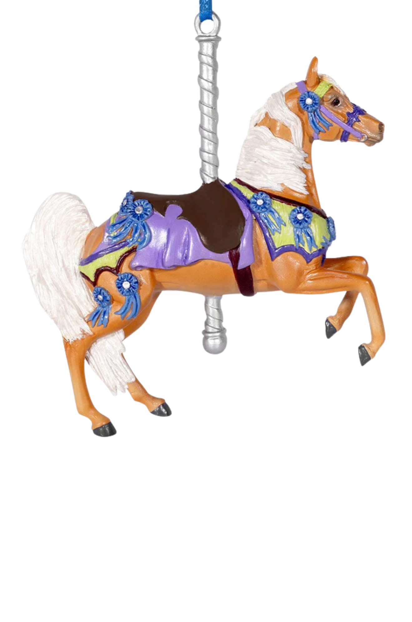 Decorative horse ornament with colorful saddle and blue accents on a white background