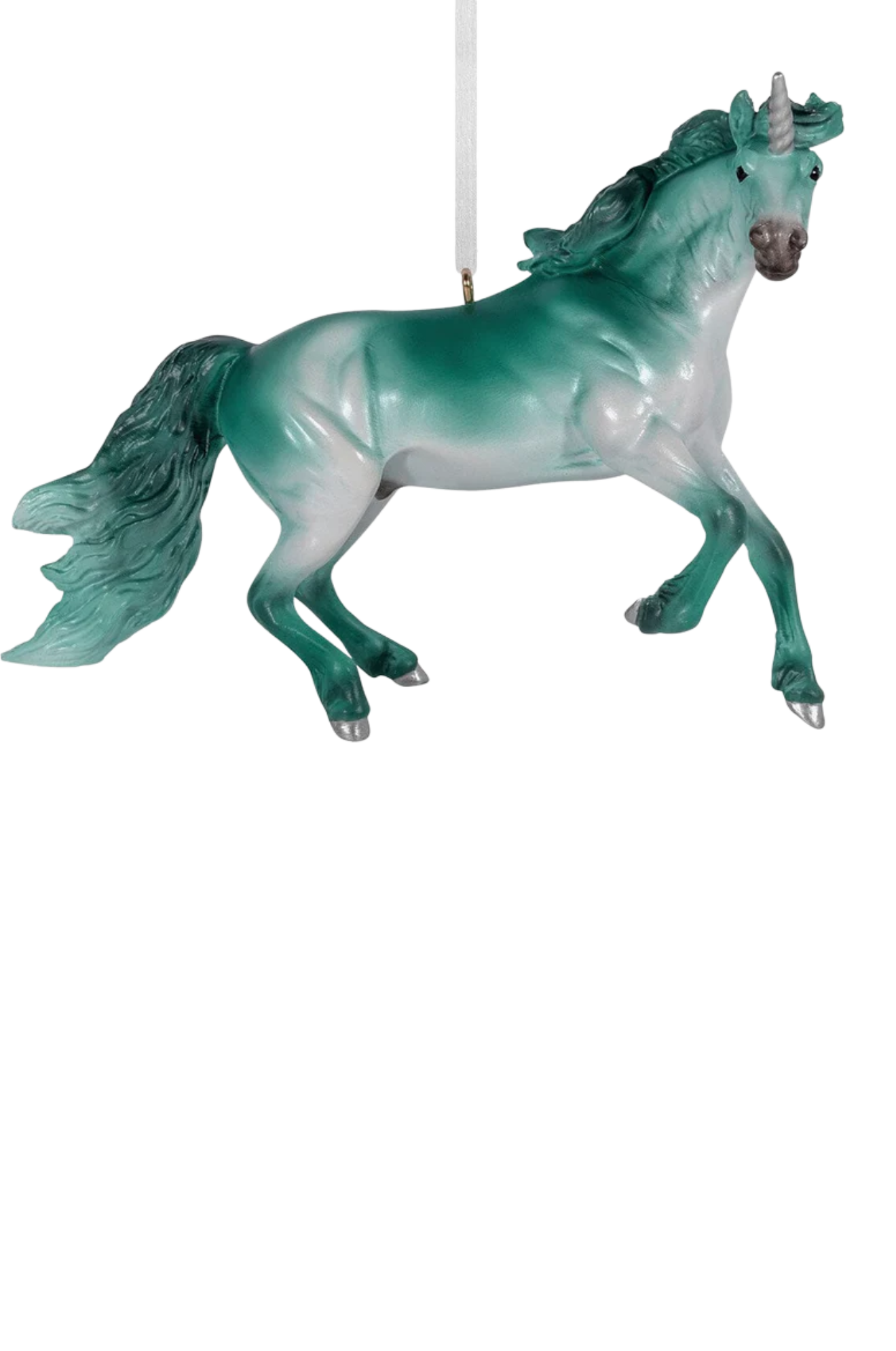 Teal unicorn figurine on a white background